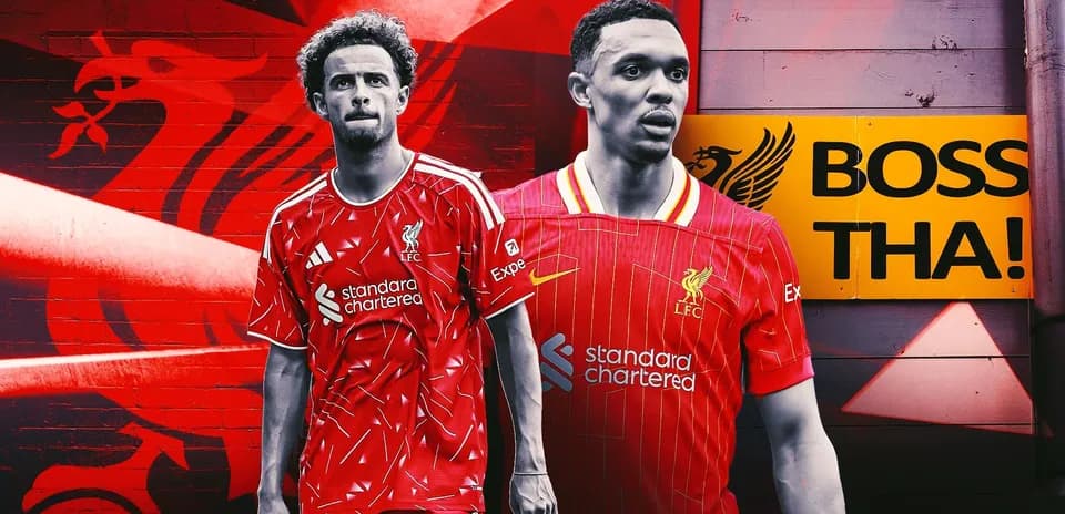 Two Liverpool players posing in red kits