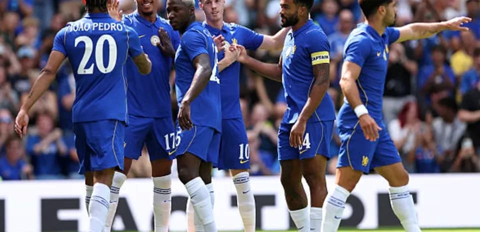 Chelsea players celebrating a goal during match