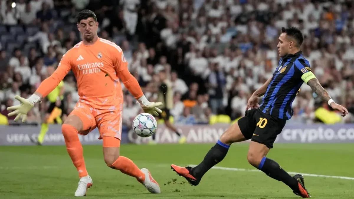 Goalkeeper saves shot from player during match