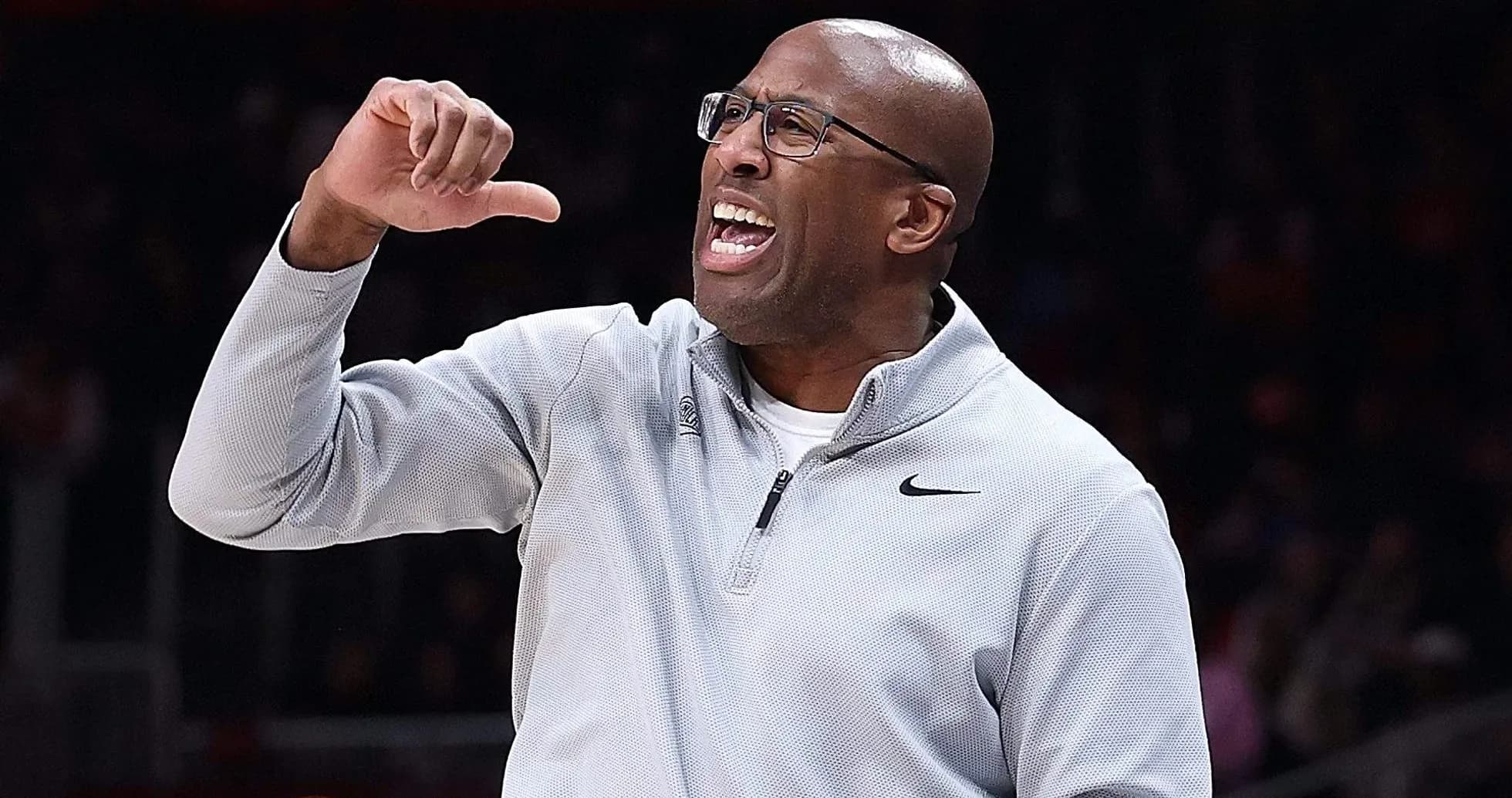 Coach gesturing and shouting during a game