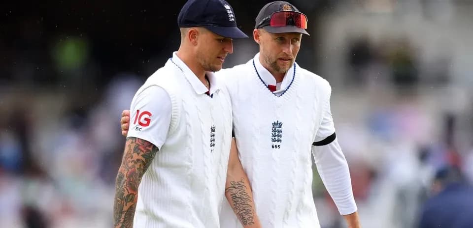 Two England cricketers walking off the field together