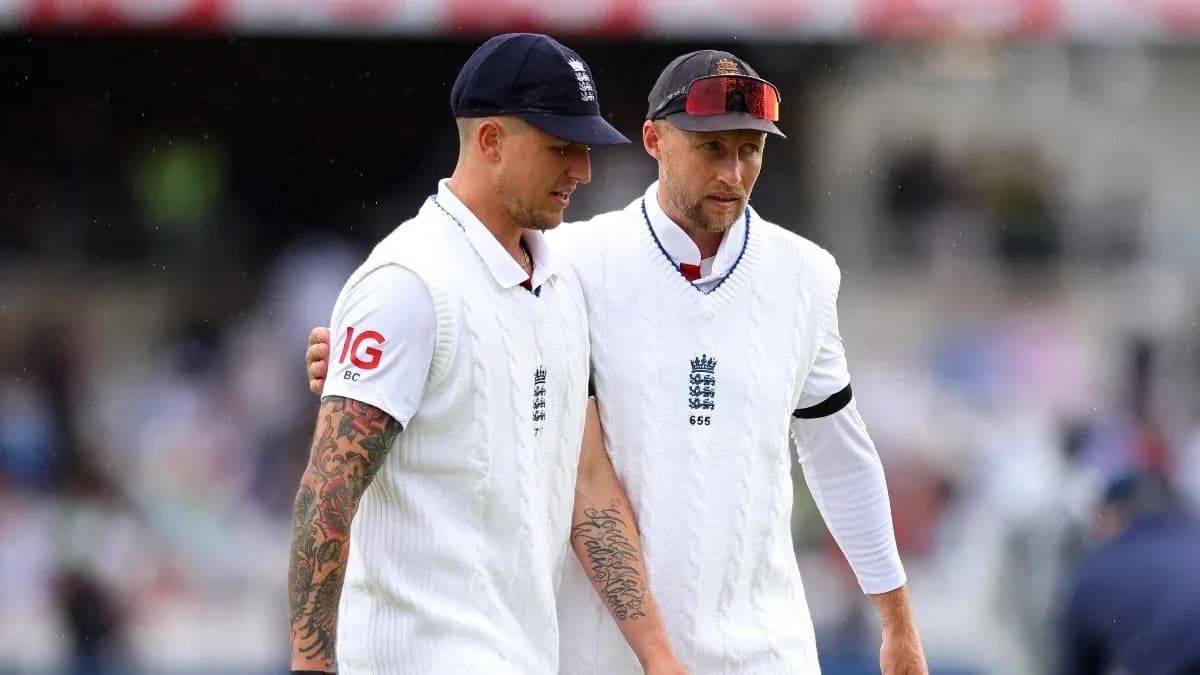 Two England cricketers walking off the field together