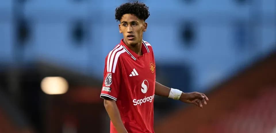 Young player in Manchester United jersey on field