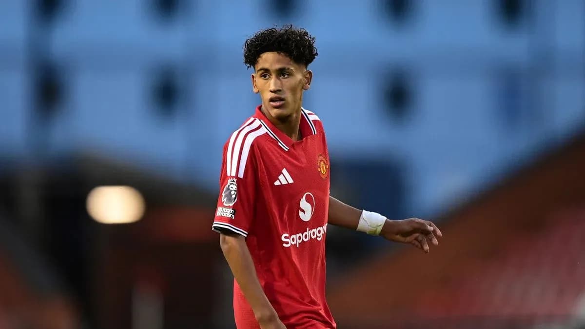 Young player in Manchester United jersey on field