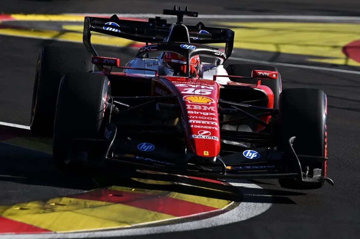 Ferrari Formula 1 car racing on track corner