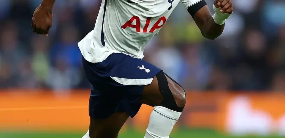 Player running with ball during a match