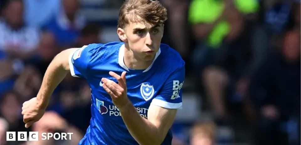Player running during a match for Portsmouth