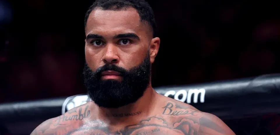 Fighter with tattoos preparing for match
