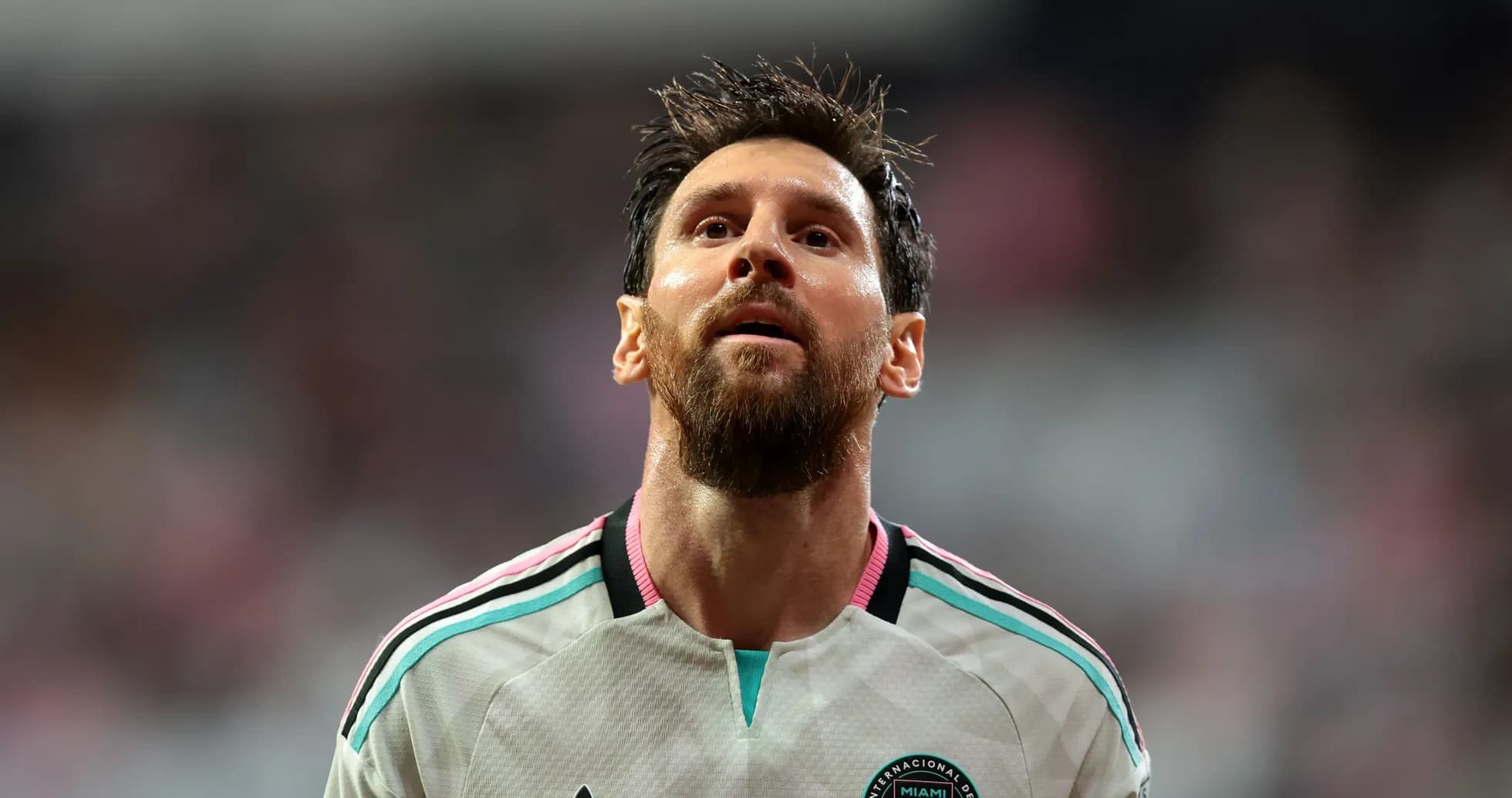 Lionel Messi looking up during a match