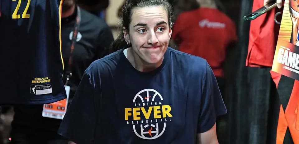 Player walking out wearing Indiana Fever shirt