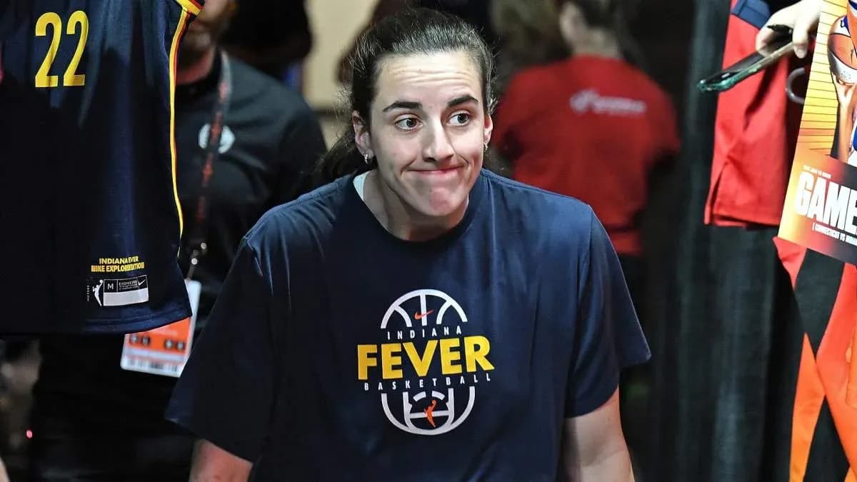 Player walking out wearing Indiana Fever shirt