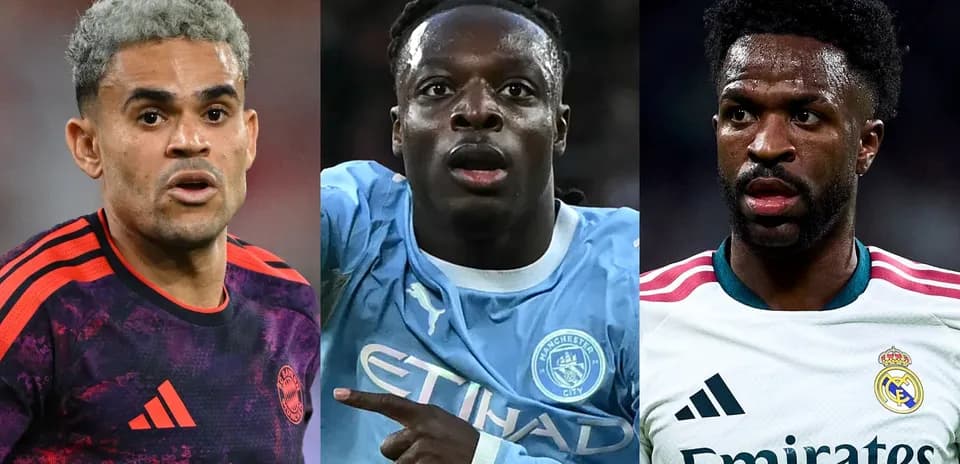 Three football players in club jerseys during match