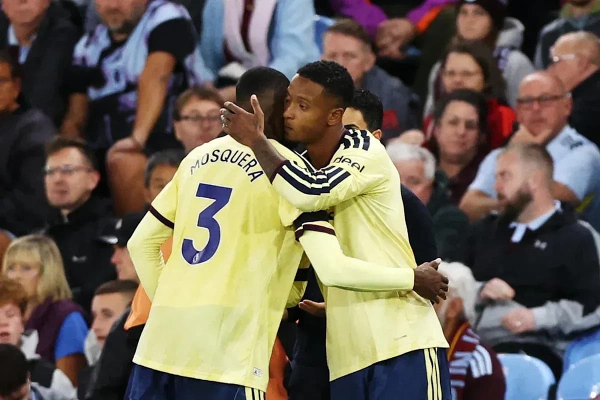 Players embracing during a football match celebration