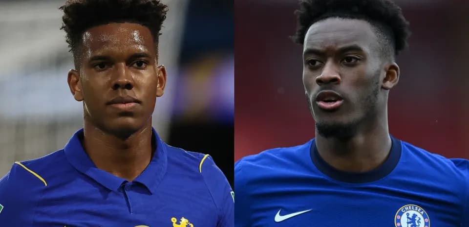 Two Chelsea players in blue jerseys facing camera