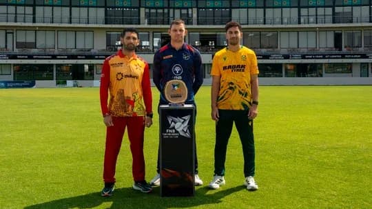 Three cricket captains posing with trophy on field