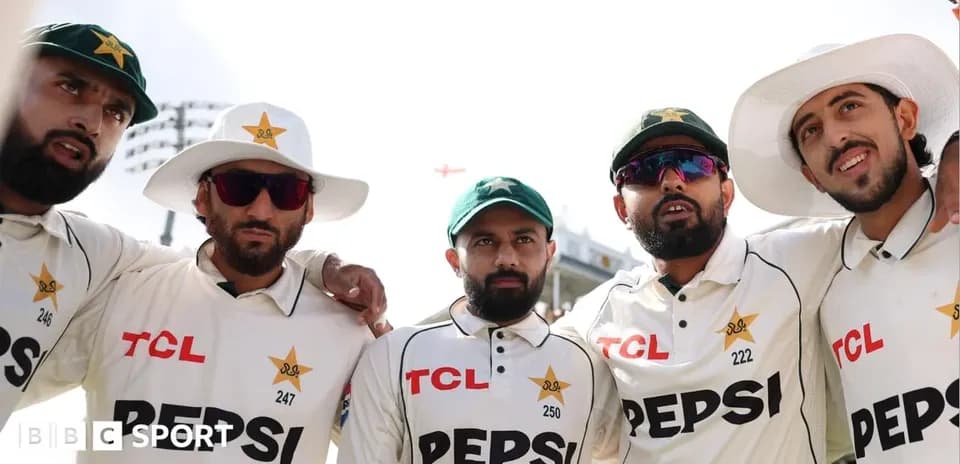 Five Pakistani cricketers posing together on field