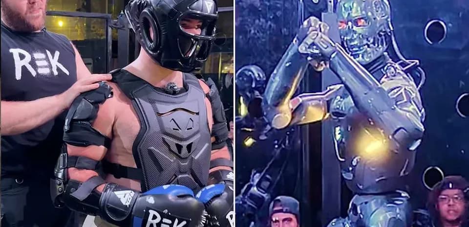 Man in protective gear with robot in background