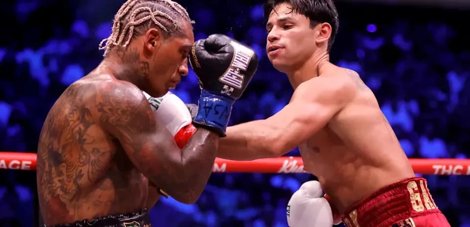Boxers exchanging punches during a match