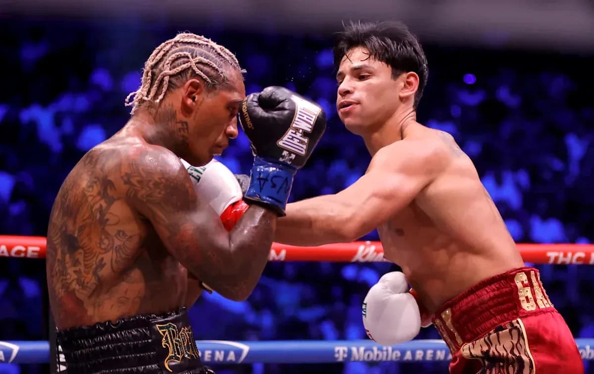 Boxers exchanging punches during a match