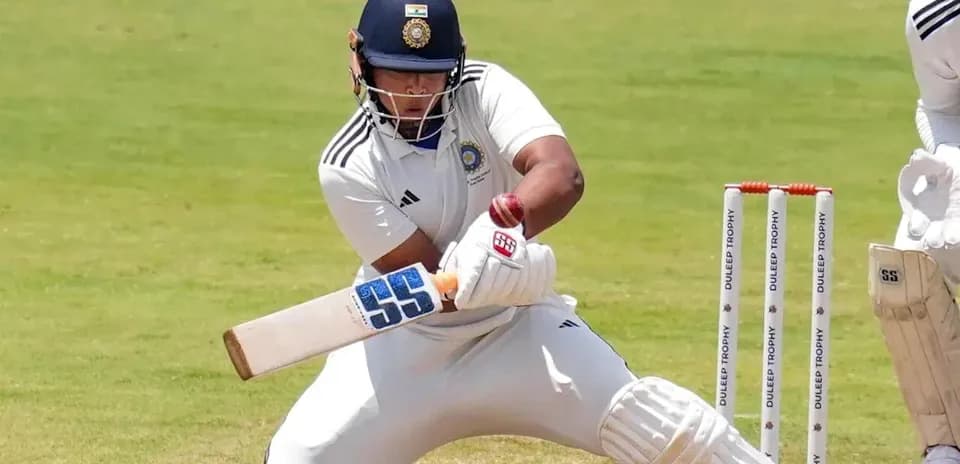 Batsman playing a shot during cricket match