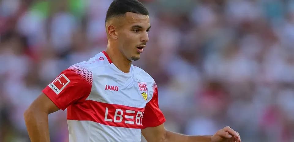 Player in Stuttgart jersey running on the field