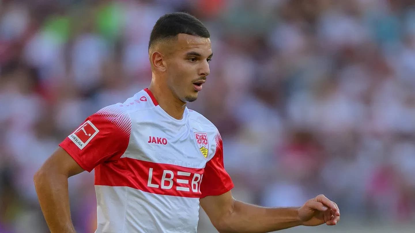 Player in Stuttgart jersey running on the field