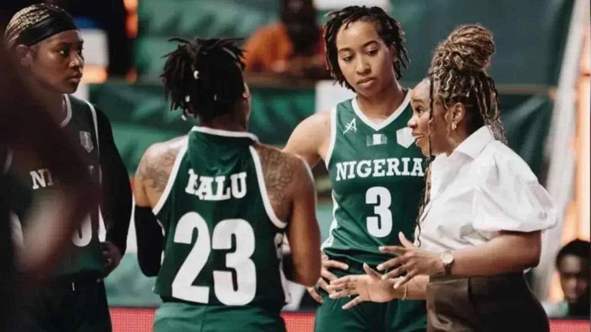 Nigeria women's basketball team in huddle during timeout