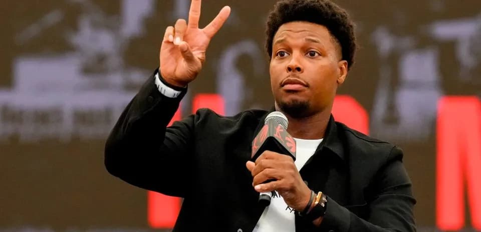 Player gesturing with two fingers during press conference