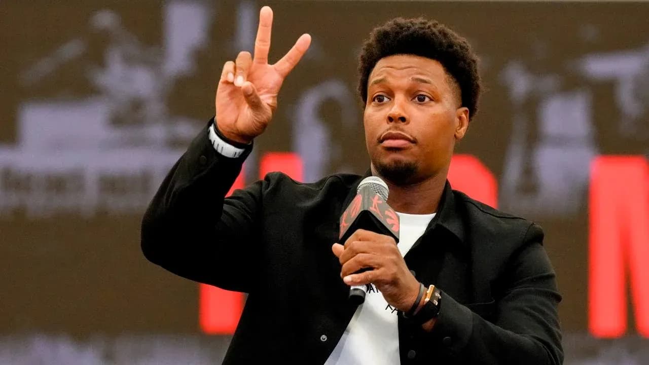 Player gesturing with two fingers during press conference