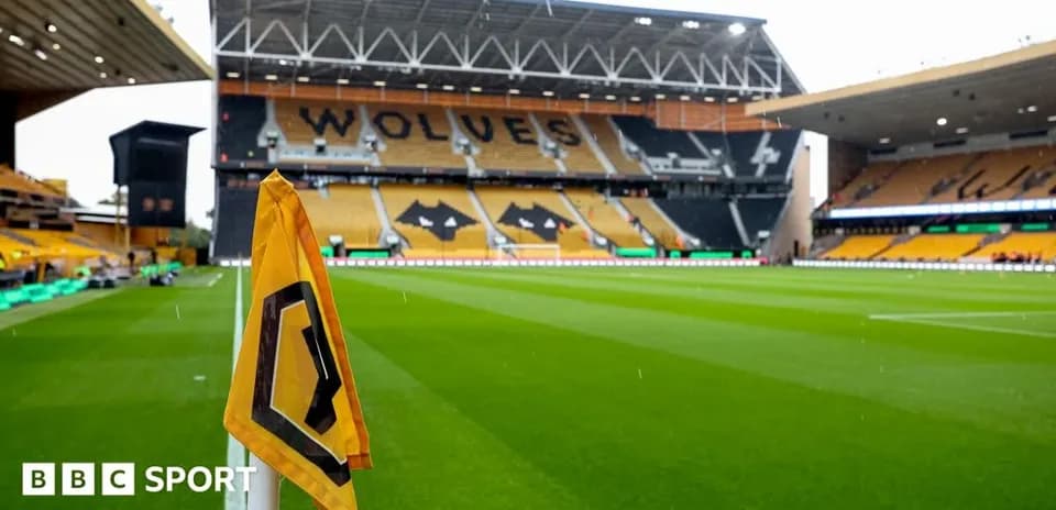 Corner flag in front of Molineux Stadium stands