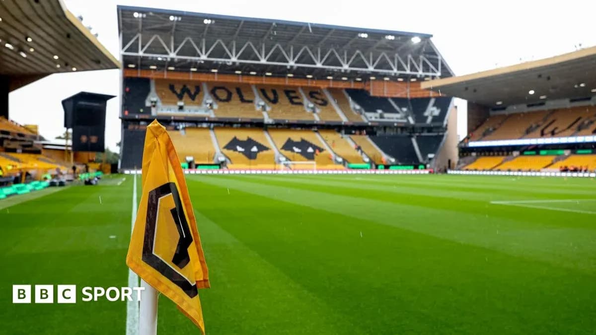Corner flag in front of Molineux Stadium stands