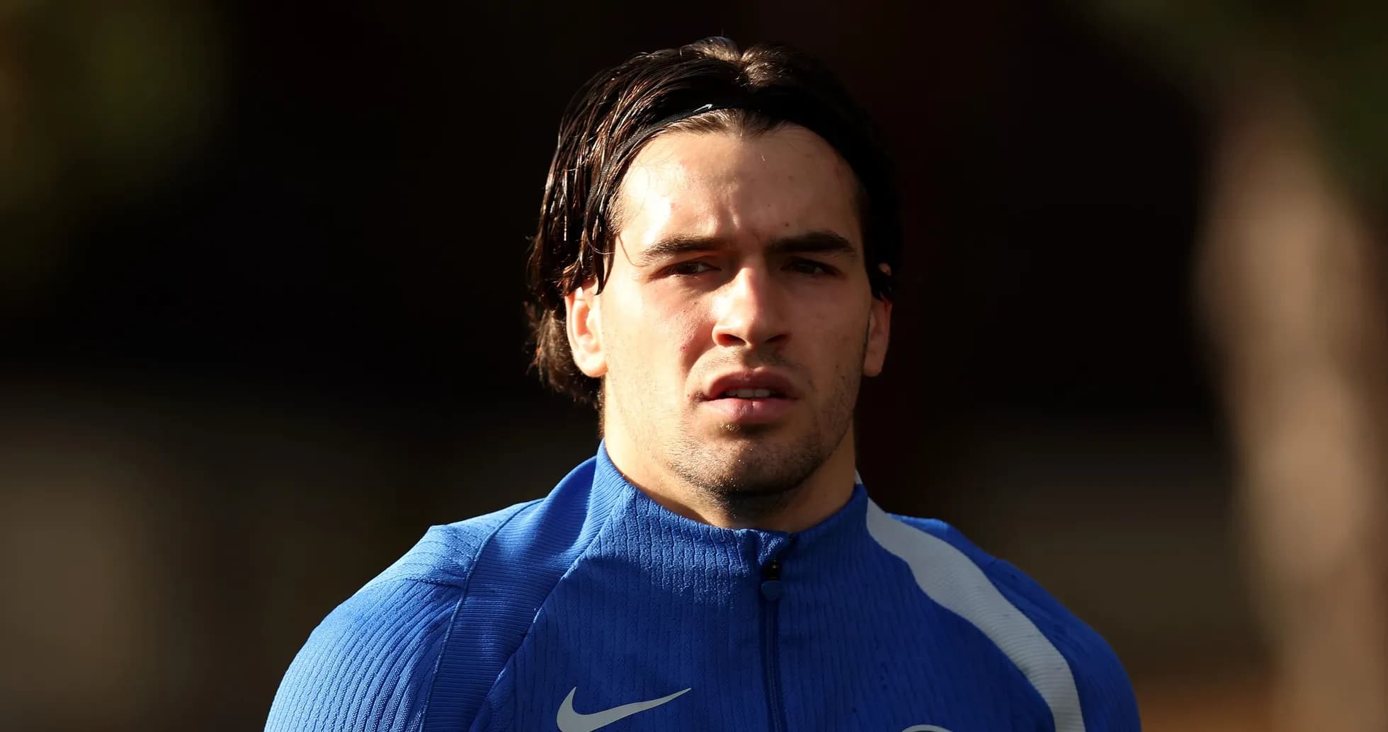 Player in blue training gear during session