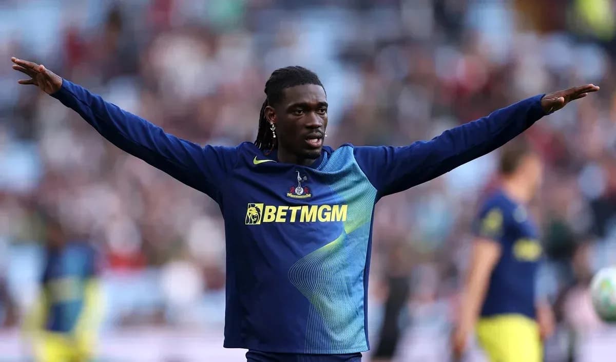 Player stretching arms during warm-up before match