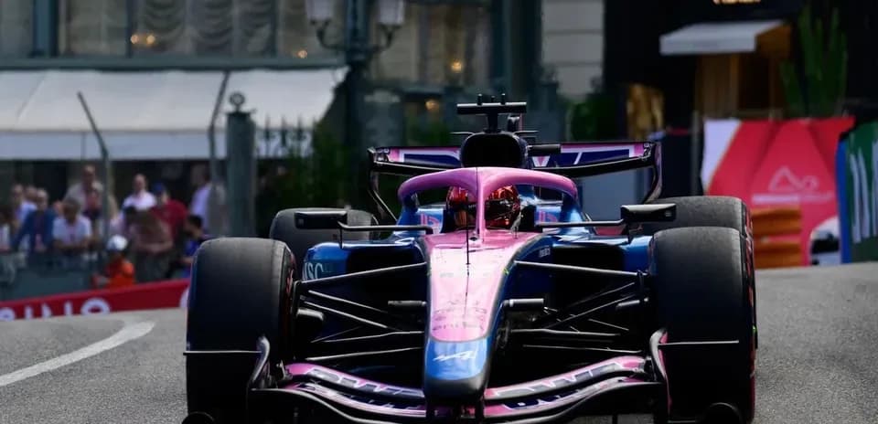 Formula 1 car racing around a corner on street circuit