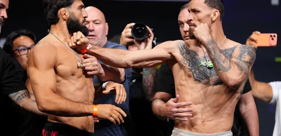 Two fighters face off during weigh-in event