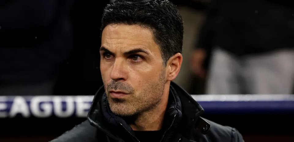 Coach sitting on the bench during a match