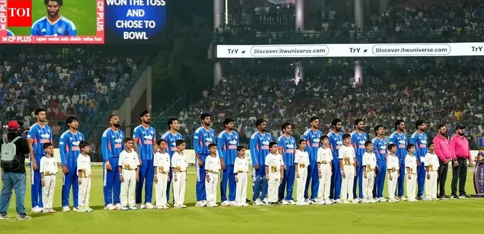 Cricket team and children standing before match