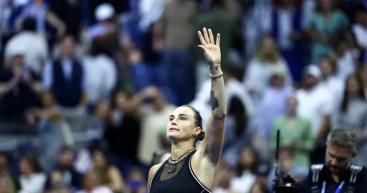 Player waving to crowd after match victory