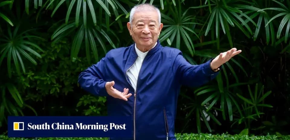 Person performing a pose in front of greenery