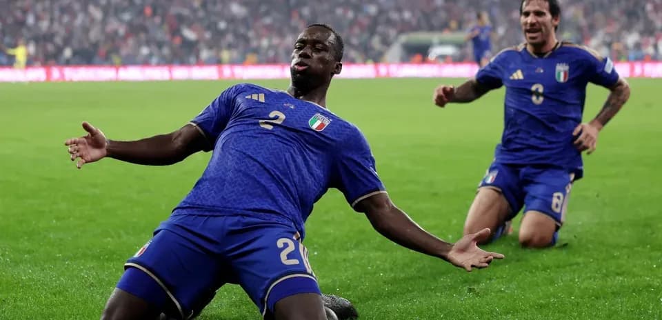 Italian players celebrating a goal on the field