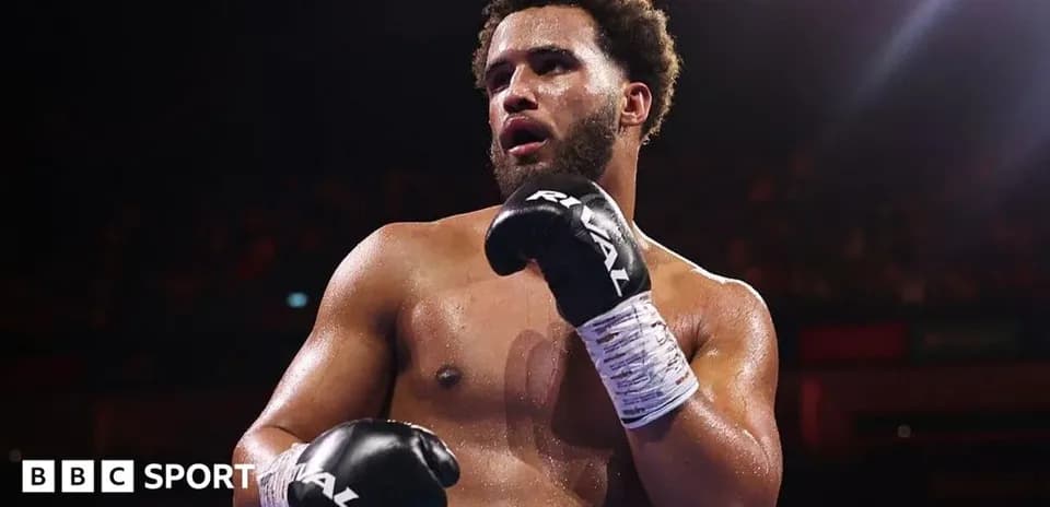 Boxer in the ring wearing gloves and wrapped hands