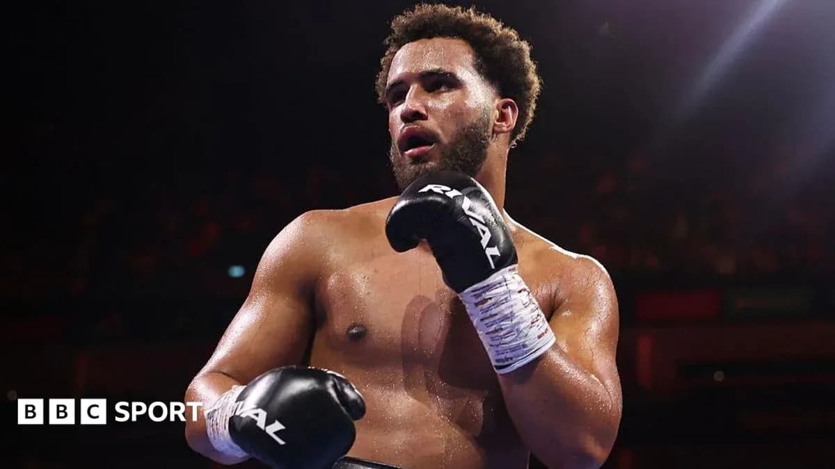 Boxer in the ring wearing gloves and wrapped hands