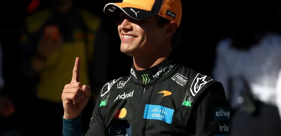 Driver celebrating with finger raised after qualifying