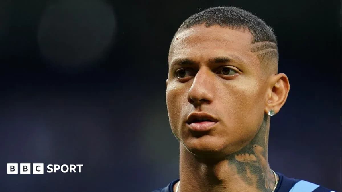 Player with short hair and tattoos on neck