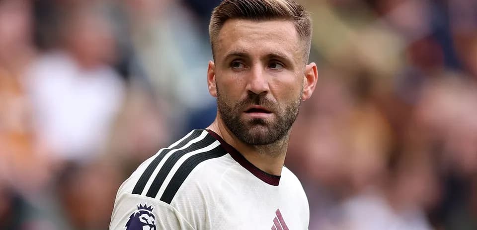 Player wearing Manchester United jersey on the field