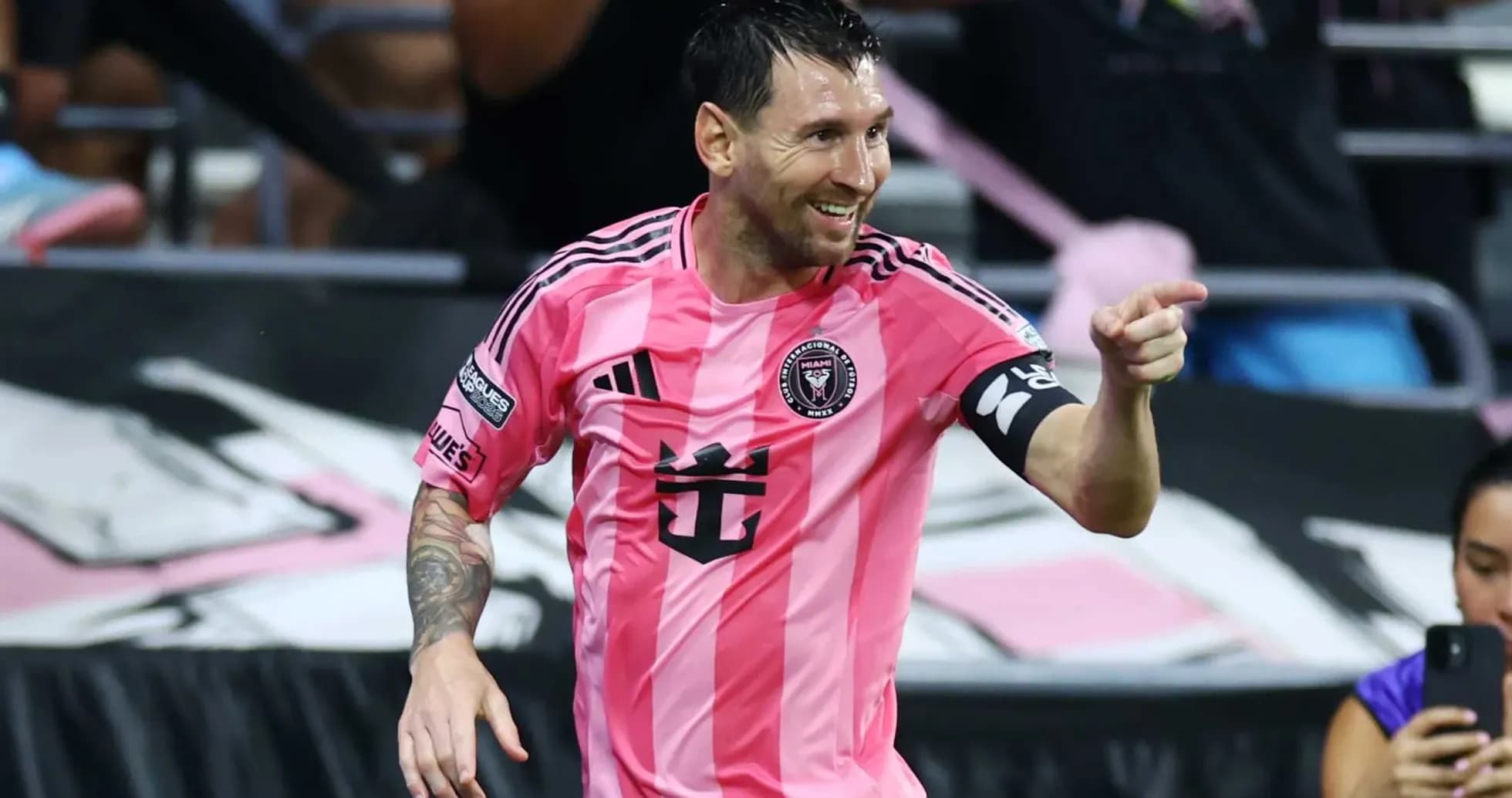 Lionel Messi celebrating in Inter Miami pink jersey