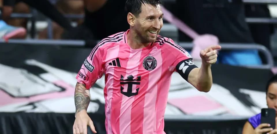 Lionel Messi celebrating in Inter Miami pink jersey