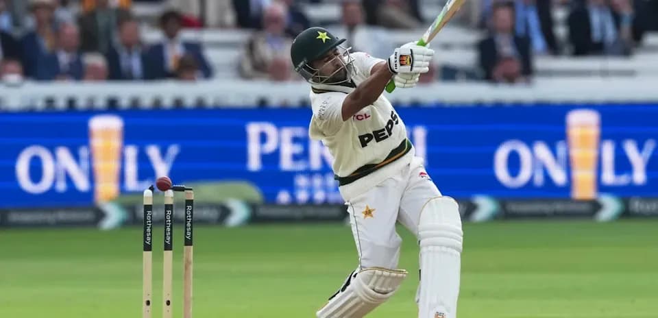 Batsman playing a shot during a cricket match