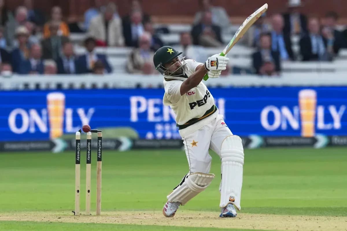 Batsman playing a shot during a cricket match
