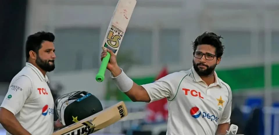Batsman celebrating after scoring runs with teammate